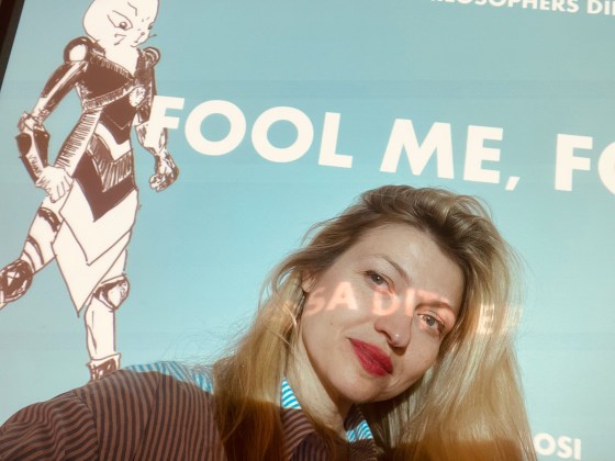 Tessa Ditner Amorosi in front of the workshop title page